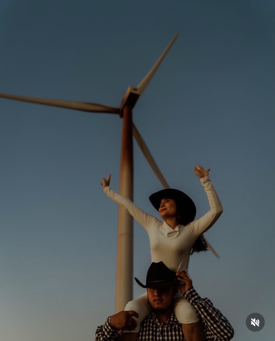 Couple at a wind turbine